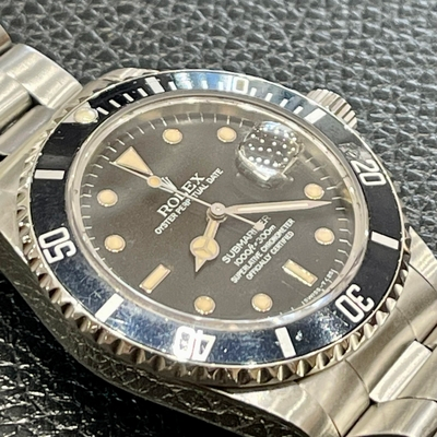 Rolex Submariner Date, Indexes brown with patina, ref.16800 from 1985,